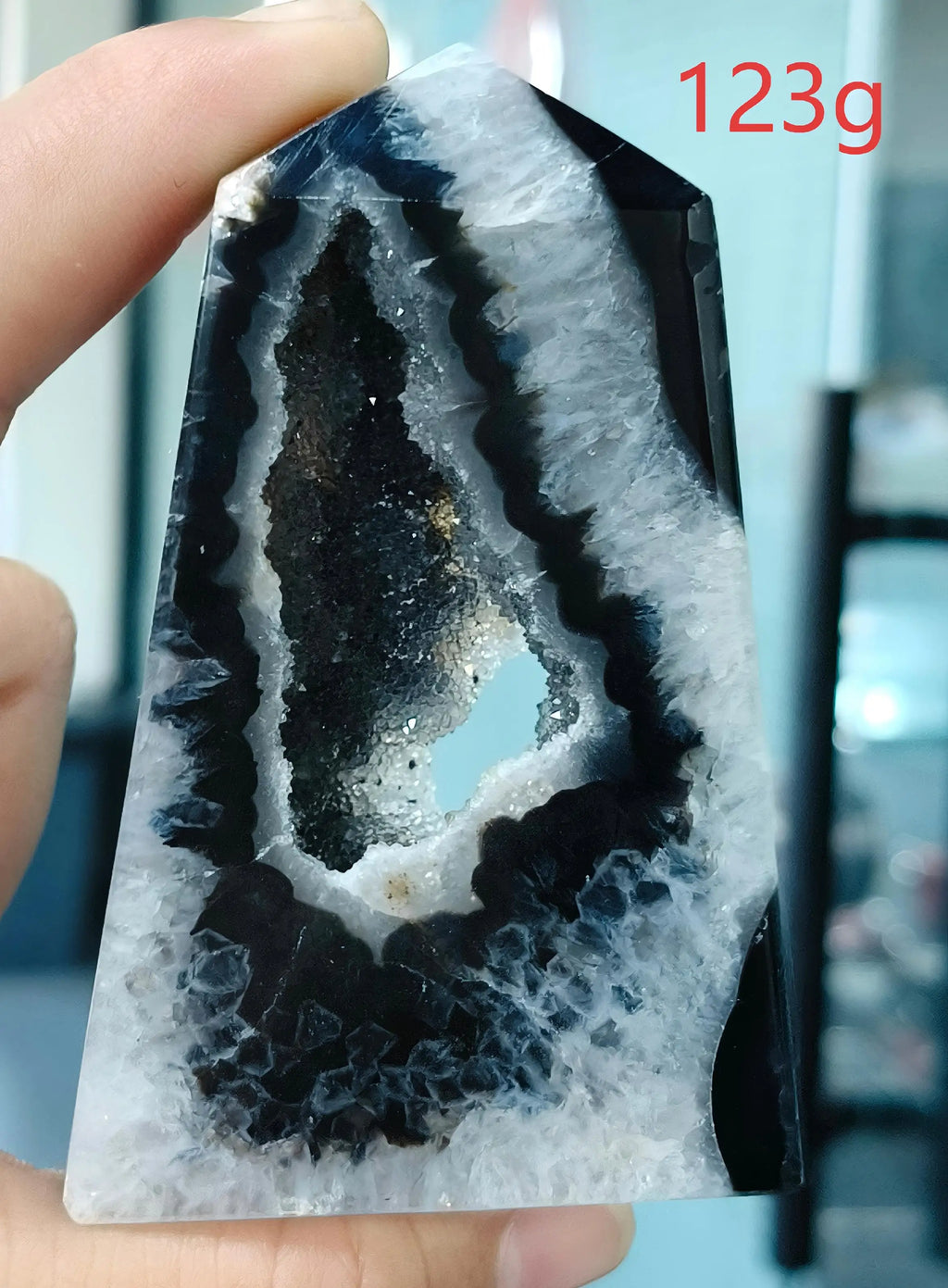 Black Agate Geode Point 102g — Elegant Home Decor, ambient mood shot