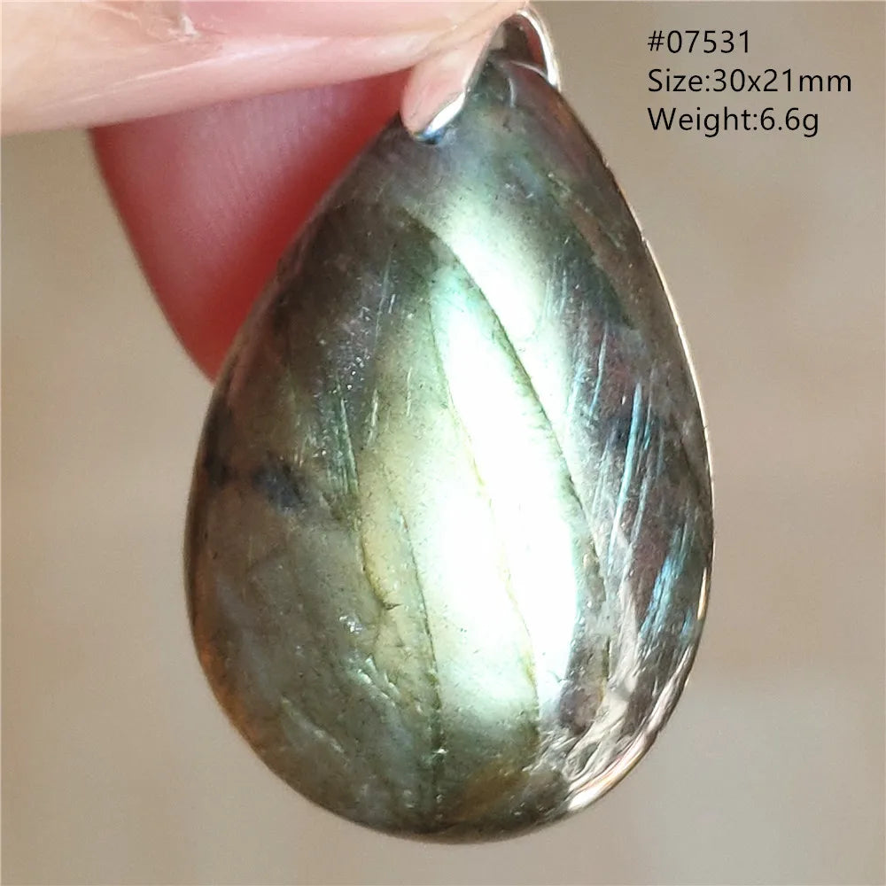 Labradorite Teardrop Pendant — A Soothing Blue Gemstone, warm tone view