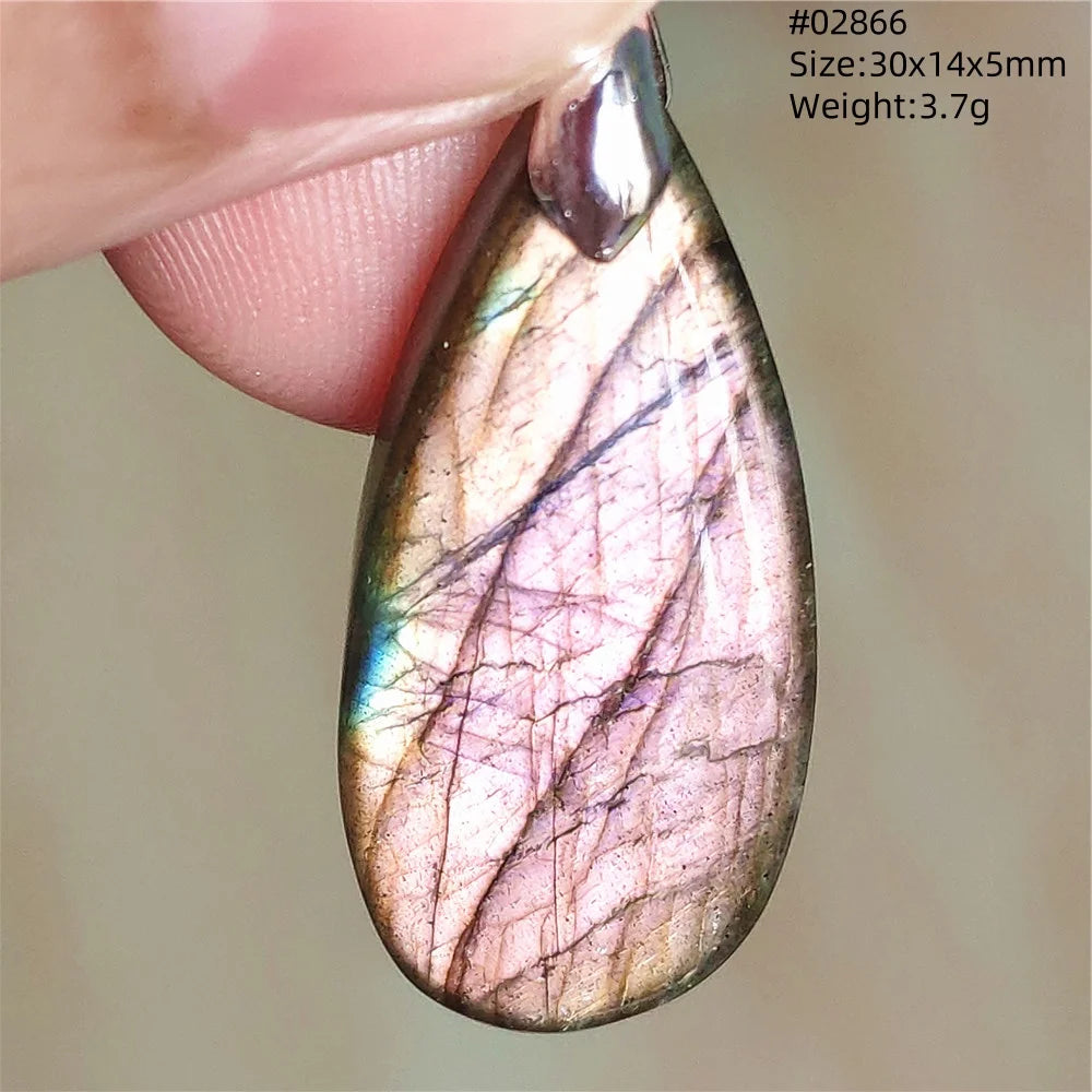 Labradorite Teardrop Pendant — A Soothing Blue Gemstone, warm tone view