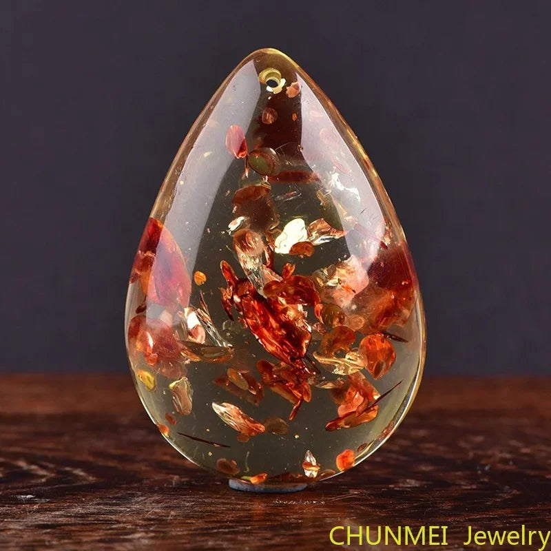 Beeswax Amber Pendant Necklace — Floral Inclusions, close-up detail